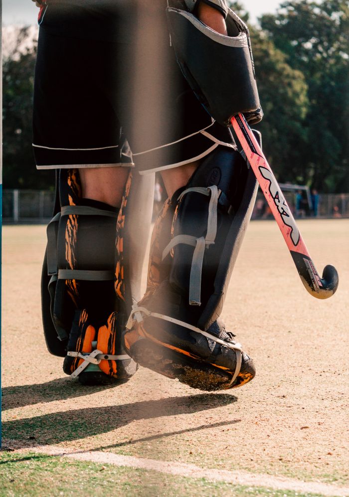 Crafting Captivating Headlines: Your awesome post title goes here Close-up of a field hockey goalie ready to play on a sunny day in Chaco, Argentina.